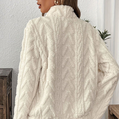 Portez un pull super doux Pull à demi-fermeture éclair avec poches en peluche.